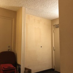 Quality Inn Huron - The first sign you saw at the front desk was"No Pets" When entering our room.....