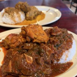 Sabor Dominicano - Brown stew chicken at the top, oxtail at the bottom