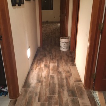 Empire Today - This is the hallway during installation that is tile- not wood! - Carpet Installation Near Me
