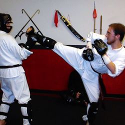 Chinese Martial Arts Center - Shaolin Kung Fu Sparring Match with Protective Gear