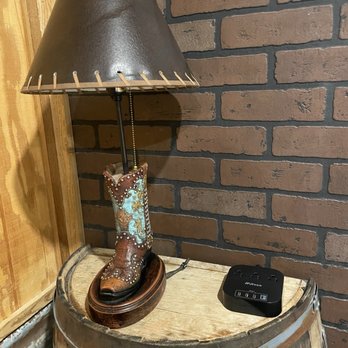 Big Texan Motel - Boot lamp and charging port by bedside - Hotels Near Me - Amarillo, Texas