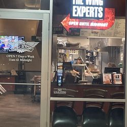 Wingstop - A not open restaurant that claims to be open until midnight