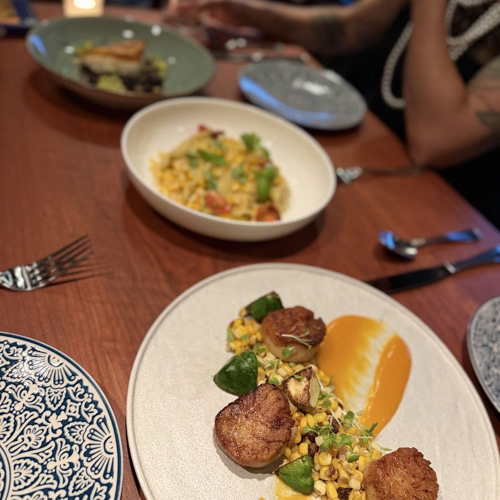 Scallops, SUMMER CORN AGNOLOTTI and Halibut, all entrees Scallops, SUMMER CORN AGNOLOTTI and Halibut, all entrees