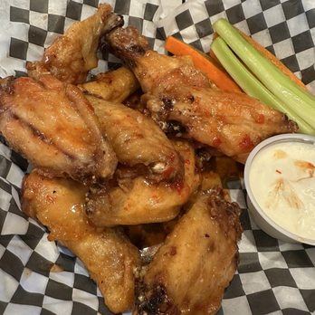 The Huddle Kitchen & Bar - Thai chili wings - New American Near Me - Bolton Landing, New York The Huddle Kitchen & Bar - Thai chili wings - New American Near Me - Bolton Landing, New York
