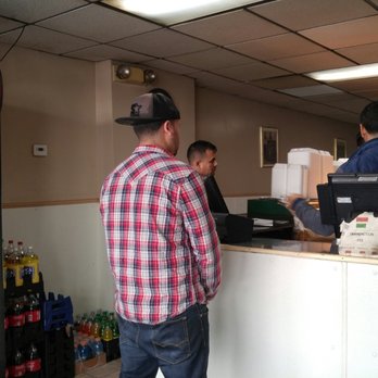 Luso's Bar-B-Q - The order counter. The grill area is behind it. - Portuguese Near Me - Perth Amboy, New Jersey