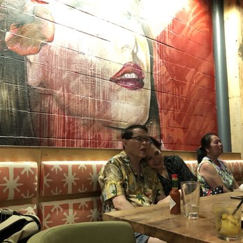 Moku Kitchen - Interior - cool wall art - Cocktail Bars Near Me - Honolulu, Hawaii