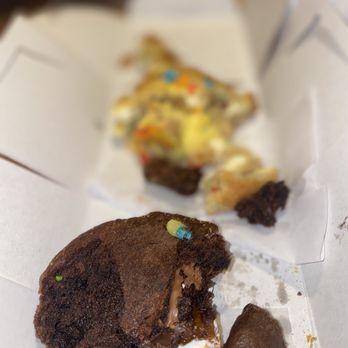 Gooey on The Inside - a half eaten chocolate cookie - Desserts Near Me - New York, New York Gooey on The Inside - a half eaten chocolate cookie - Desserts Near Me - New York, New York