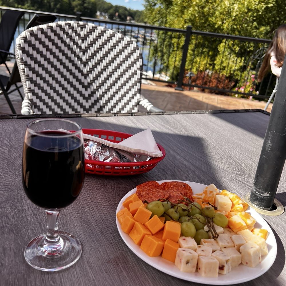 Nauti Vine Winery - Cheese plate and wine glass - Wineries Near Me - Akron, Ohio Nauti Vine Winery - Cheese plate and wine glass - Wineries Near Me - Akron, Ohio