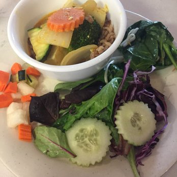Araya's Place - A few of the salad options and a bowl of brown rice with curried veggies and tofu - Thai Near Me - Seattle, Washington Araya's Place - A few of the salad options and a bowl of brown rice with curried veggies and tofu - Thai Near Me - Seattle, Washington