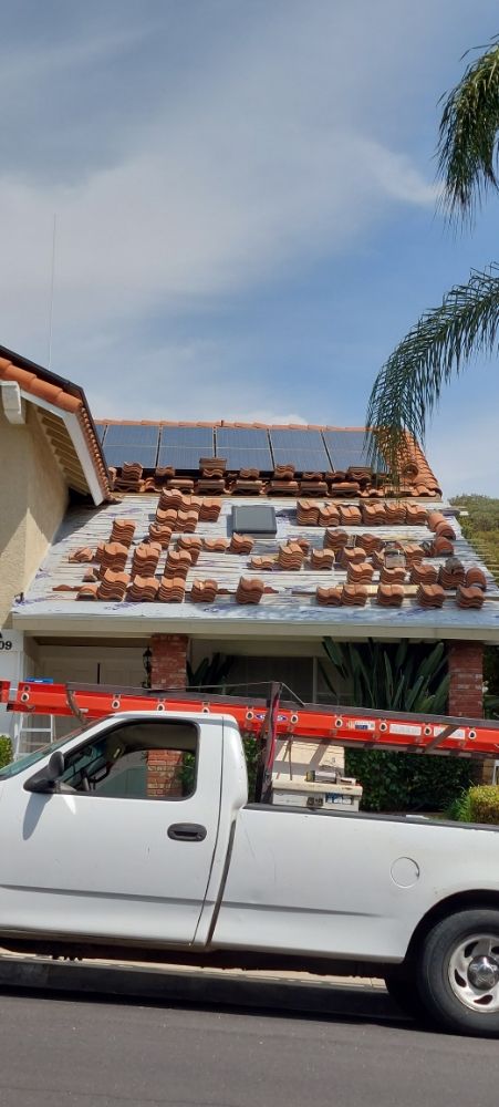 Slide of A. L. Follett Roofing