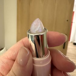 Winky Lux - Glimmer Balm in Unicorn.  Cute.  Not glittery on your lips - just a slight shimmer with light color.