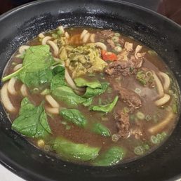 Beef noodle soup with udon noodles