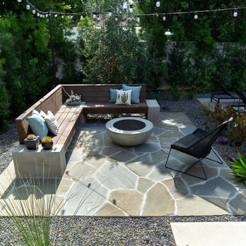Eco Landscape Design and Build - New flagstone patio with gas firepit and built in seating. - Landscaping Near Me Eco Landscape Design and Build - New flagstone patio with gas firepit and built in seating. - Landscaping Near Me