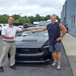 Sayville Ford - My Salesmnan Vinnie handing over the keys to my new Dark Horse.