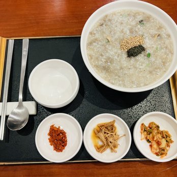 Bonjuk - a bowl of porridget and bowls of soup - Korean Near Me - Flushing, New York