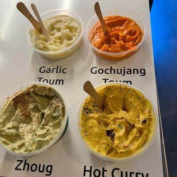Obour Foods - Garlic please. Taste with wooden spoon - Specialty Food Near Me - San Francisco, California Obour Foods - Garlic please. Taste with wooden spoon - Specialty Food Near Me - San Francisco, California