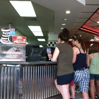 Steak ’n Shake - a group of people standing at a counter - Fast Food Near Me - Cumming, Georgia Steak ’n Shake - a group of people standing at a counter - Fast Food Near Me - Cumming, Georgia