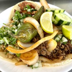 Los Primos Taco Truck - The trifecta! How good does that look? Imagine that buried in salsa!