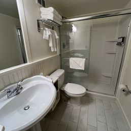 Decent size bathroom with a huge walkin shower