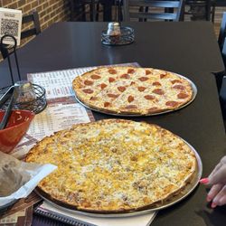 Crawford's Pizza & Pub - BBQ Chicken Pizza and pepperoni pizza