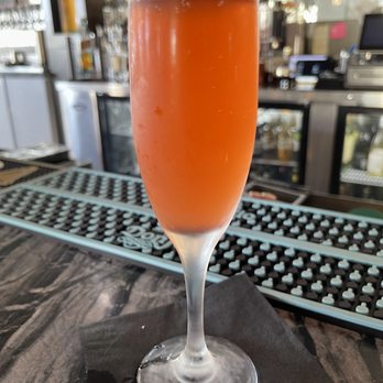 Wolf's Steakhouse - Cranberry mimosa - Steakhouses Near Me - Cooper City, Florida