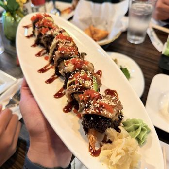Sun Cuisines - Black Dragon Roll - Burmese Near Me - Williamsville, New York Sun Cuisines - Black Dragon Roll - Burmese Near Me - Williamsville, New York