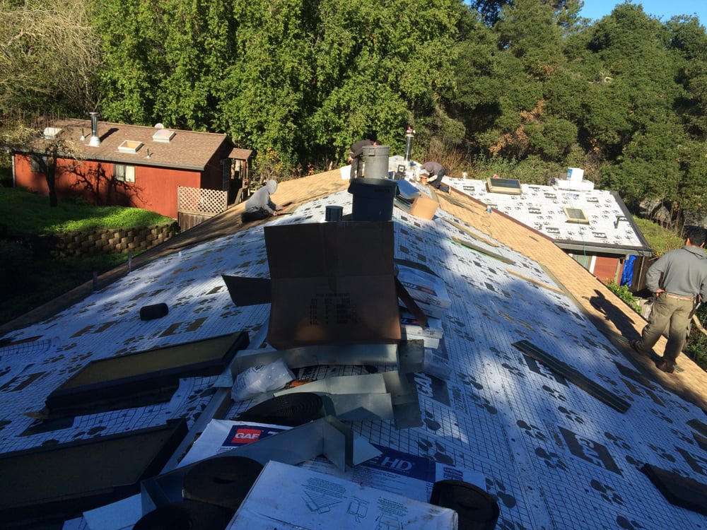 Slide of Caruzo's Roofing Contractors