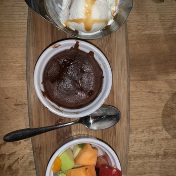 Le Côte - Our dessert the second night........molten lava cake- so rich- accompanied by fruit and French vanilla ice cream, drizzled in caramel. - Barbeque Near Me - Beloeil, Quebec Le Côte - Our dessert the second night........molten lava cake- so rich- accompanied by fruit and French vanilla ice cream, drizzled in caramel. - Barbeque Near Me - Beloeil, Quebec