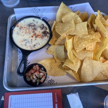 PopStroke - I chips and queso - Mini Golf Near Me - Orlando, Florida PopStroke - I chips and queso - Mini Golf Near Me - Orlando, Florida