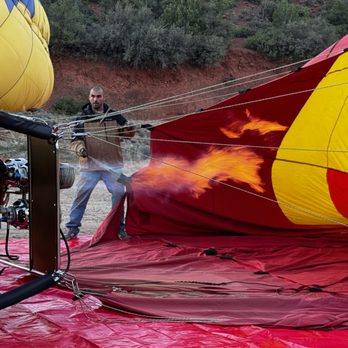 Red Rock Balloon Adventures - Ground crews fire-up the balloon to create lift before passengers board - Hot Air Balloons Near Me - Sedona, Arizona