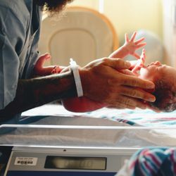 Graceful Birth Doula Services - Baby being weighed
