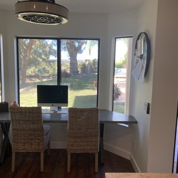 Re Imagined Interiors - Marie had this desk built for our awkward dining nook. It keeps our kitchen spacious and is great for homework. - Interior Design Near Me