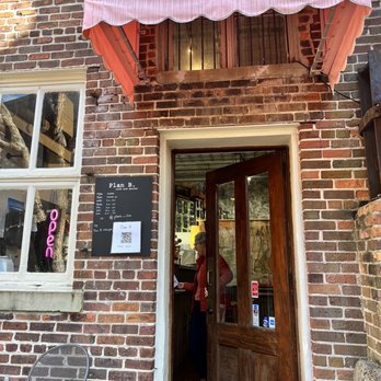 Plan B - a woman standing in the doorway of a brick building - Breakfast & Brunch Near Me - Wilmington, North Carolina Plan B - a woman standing in the doorway of a brick building - Breakfast & Brunch Near Me - Wilmington, North Carolina