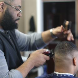 Calvin Steele - Barber cal doing a clean bald fade
