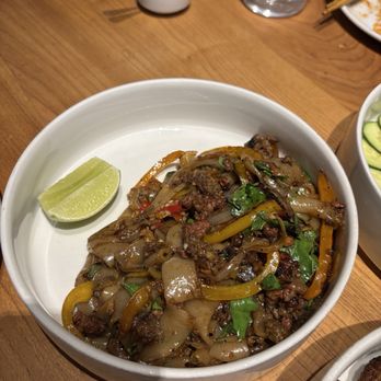 Kin Khao - PAD KEE MAO 29 SPICY STIR-FRIED DRUNKEN NOODLES GROUND PORK, CHILI+GARLIC, ONIONS, SWEET PEPPERS, HOLY BASIL, LIME - Thai Near Me - San Francisco, California Kin Khao - PAD KEE MAO 29 SPICY STIR-FRIED DRUNKEN NOODLES GROUND PORK, CHILI+GARLIC, ONIONS, SWEET PEPPERS, HOLY BASIL, LIME - Thai Near Me - San Francisco, California