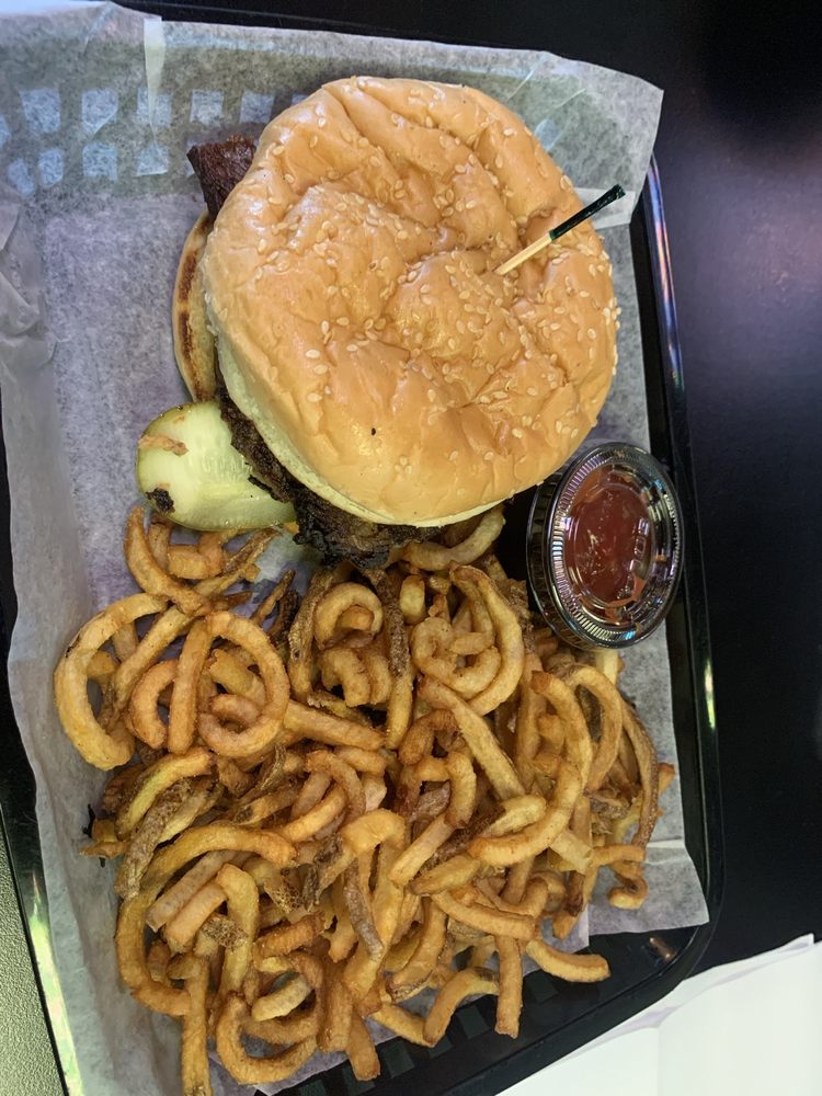 Paradise Grill and Cafe Logo