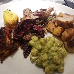 Chicken wrapped with prosciutto, roasted veggies, stuffed squash blossom, gnocchi with broccoli, And a few other things Chicken wrapped with prosciutto, roasted veggies, stuffed squash blossom, gnocchi with broccoli, And a few other things