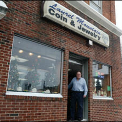Laurel Mountain Coin & Jewelry - R. Craig Bittner at the door of Laurel Mountain Coin and Jewelry.