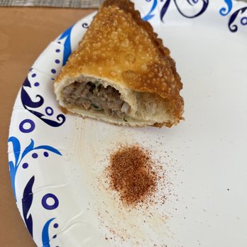 Papillon International Bakery - Empanada cut in half with chili seasoning - Desserts Near Me - Los Angeles, California Papillon International Bakery - Empanada cut in half with chili seasoning - Desserts Near Me - Los Angeles, California