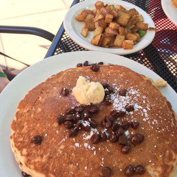 Medici - Short stack with chocolate chips and side of potatoes - Mediterranean Near Me - Normal, Illinois Medici - Short stack with chocolate chips and side of potatoes - Mediterranean Near Me - Normal, Illinois