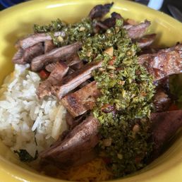 This is my new favorite- Steak Fajita bowl with a side of chinichurri sauce.