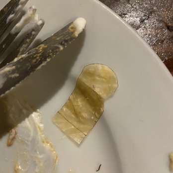 Bandidos Mexican Restaurant - A piece of a bandaid that was rolled up inside our appetizer that I horrifically unrolled to show to our server! GROSS!! - Mexican Near Me - Cumberland, Rhode Island