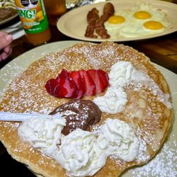 1-2-3 Breakfast Plate | Three eggs, 2 bacon strips & 1 huge pancake.