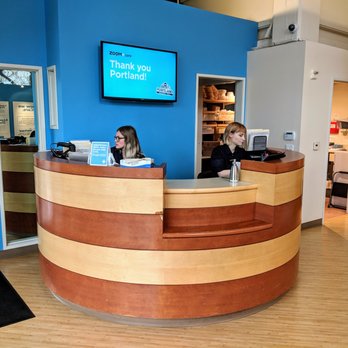 ZoomCare - Pearl District - ZOOM+Care's Pearl District assistants hard at work at the front desk. - Urgent Care Near Me - Portland, Oregon ZoomCare - Pearl District - ZOOM+Care's Pearl District assistants hard at work at the front desk. - Urgent Care Near Me - Portland, Oregon