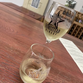 Homestead Winery - a glass of wine on a table - Wineries Near Me - Denison, Texas Homestead Winery - a glass of wine on a table - Wineries Near Me - Denison, Texas