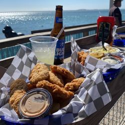 Tequila Sunset - Chicken tender basket with fries Shrimp basket with coleslaw