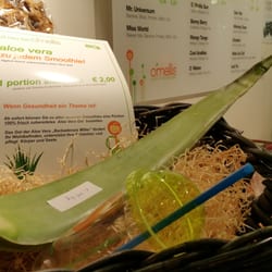 O'Mellis - They add fresh aloe Vera gel on request.  You can even buy the leaves here!