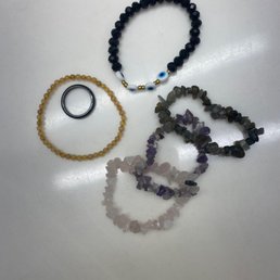 Crystal bracelets, evil eye and hematite ring Crystal bracelets, evil eye and hematite ring