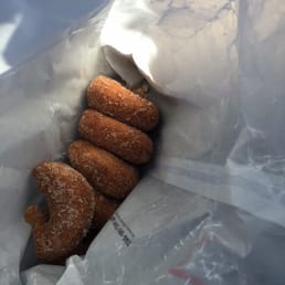 Half a dozen freshly made apple cider doughnuts. Half a dozen freshly made apple cider doughnuts.