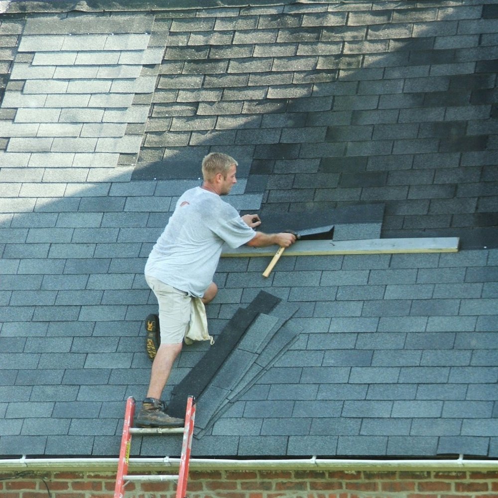 Slide of Kelly Roofing Services